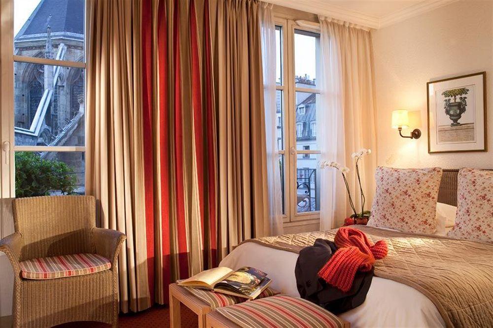 Hotel Henri IV Rive Gauche Париж Стая снимка